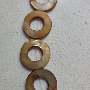 strand of circle beads for jewelry making